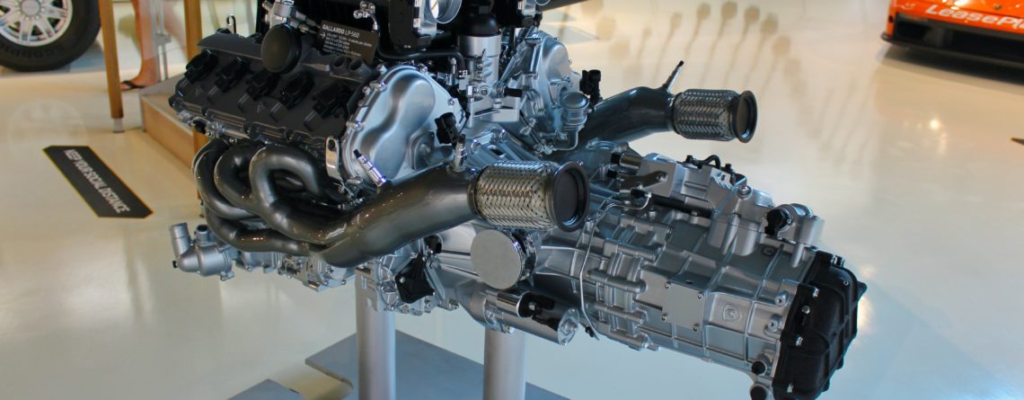 car engine on a mount in a clean showroom